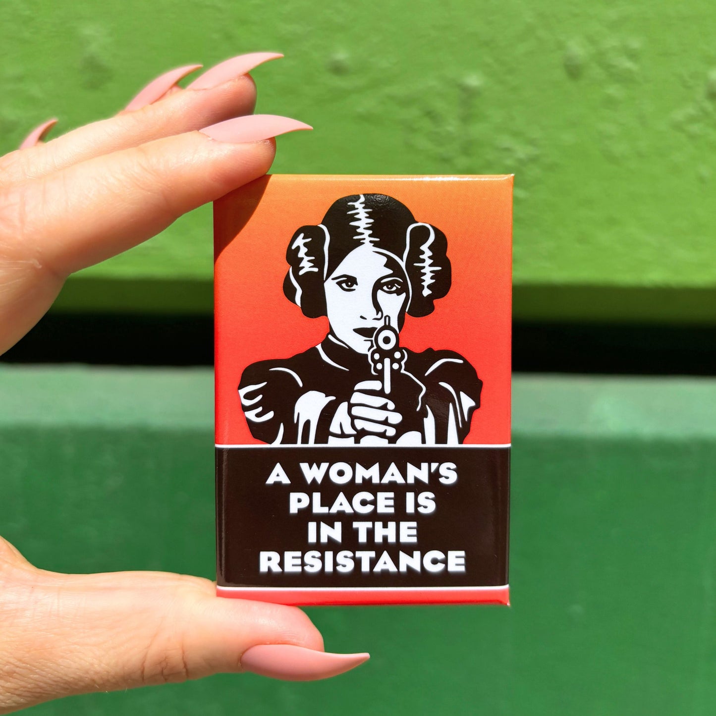 A Woman's Place Is In The Resistance Fridge Magnet