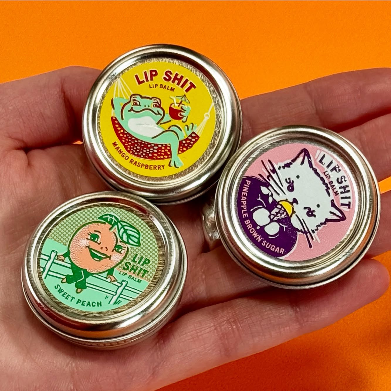 Lip Shit Lip Balm Mango Raspberry Beeswax Formula | Lip Moisturizer in Tin | .3oz | BlueQ at GetBullish