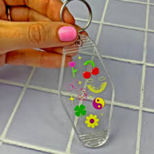 Lucky Charm Motel Keychain in Transparent Clear