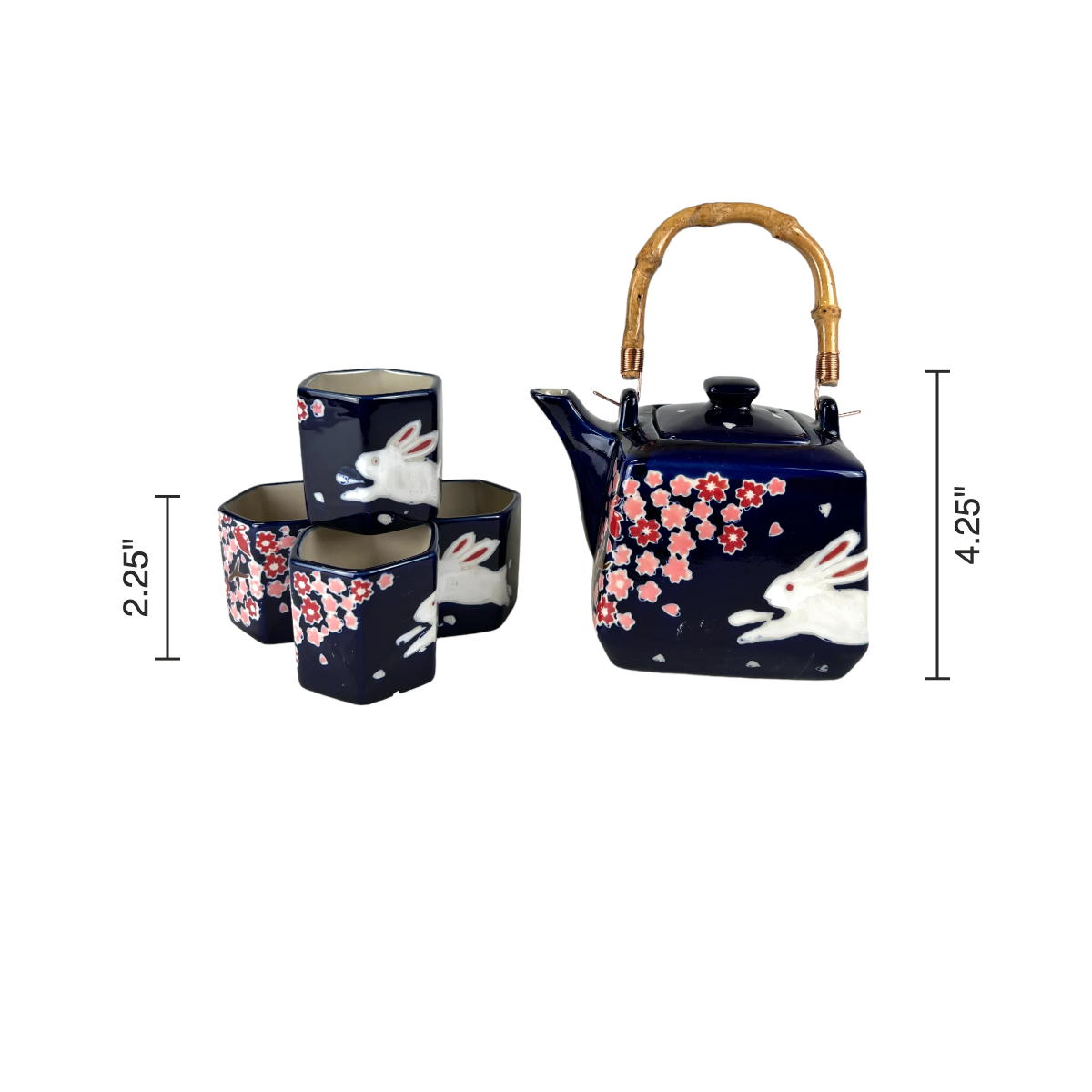 Size chart: teapot 4.25 inches tall, cups 2.25 inches tall