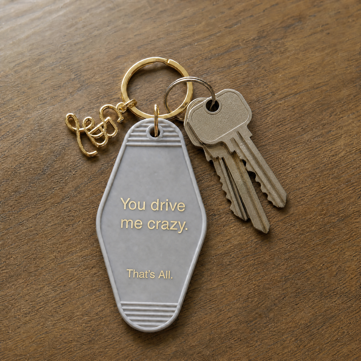 You Drive Me Crazy Motel Style Keychain in Gray with Gold Hardware
