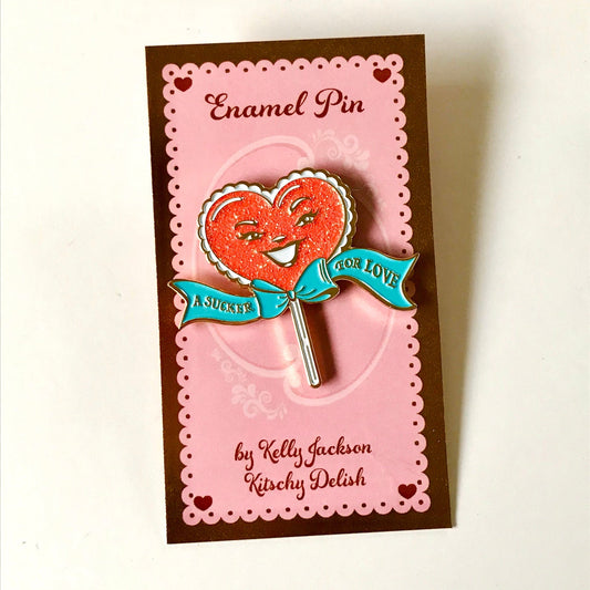 A Sucker For Love Soft Enamel Pin | Heart-Shaped Lollipop with Red Glitter