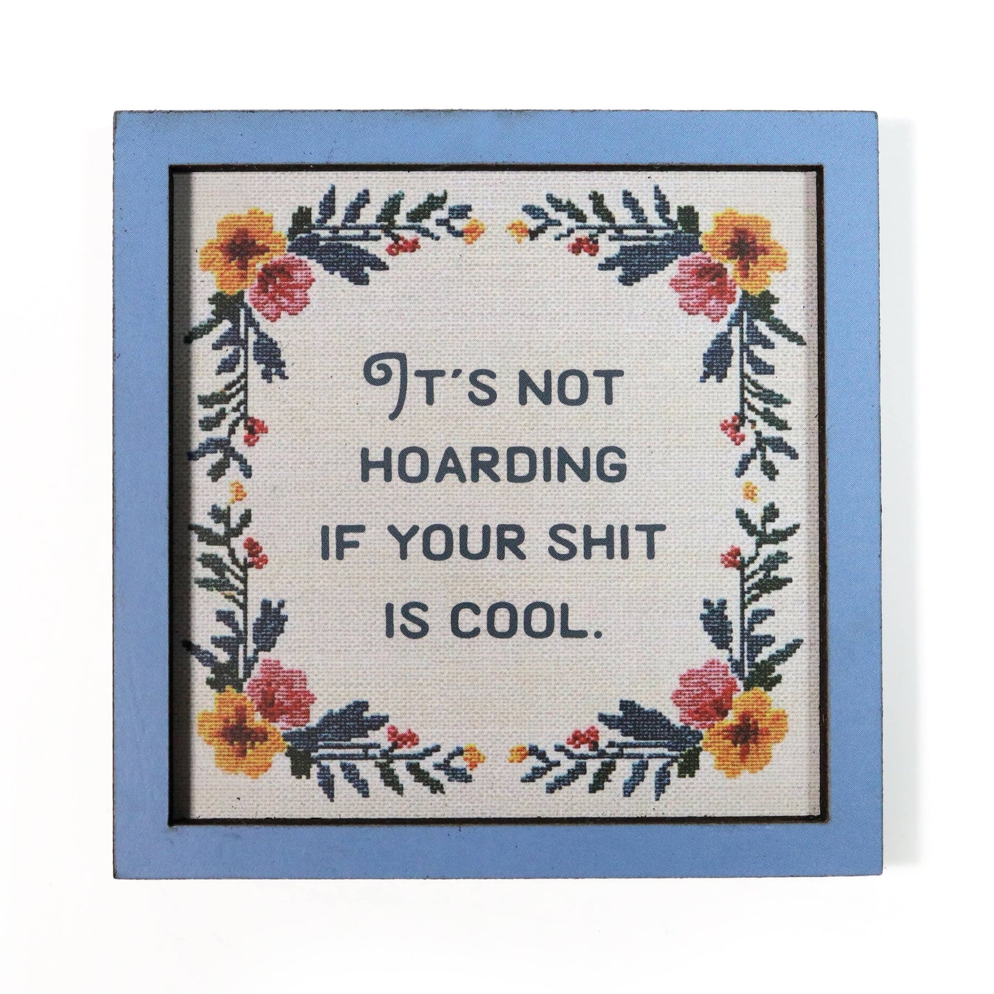 Decorative magnet with floral design and humorous quote "It's not hoarding if your shit is cool".