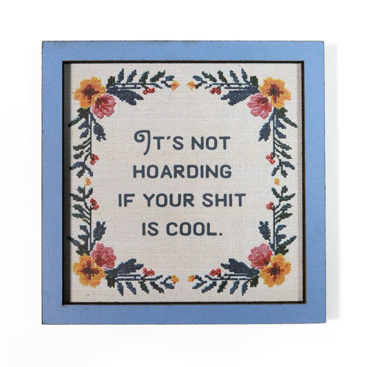 Decorative magnet with floral design and humorous quote "It's not hoarding if your shit is cool".