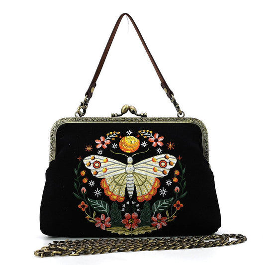 Embroidered handbag with butterfly design