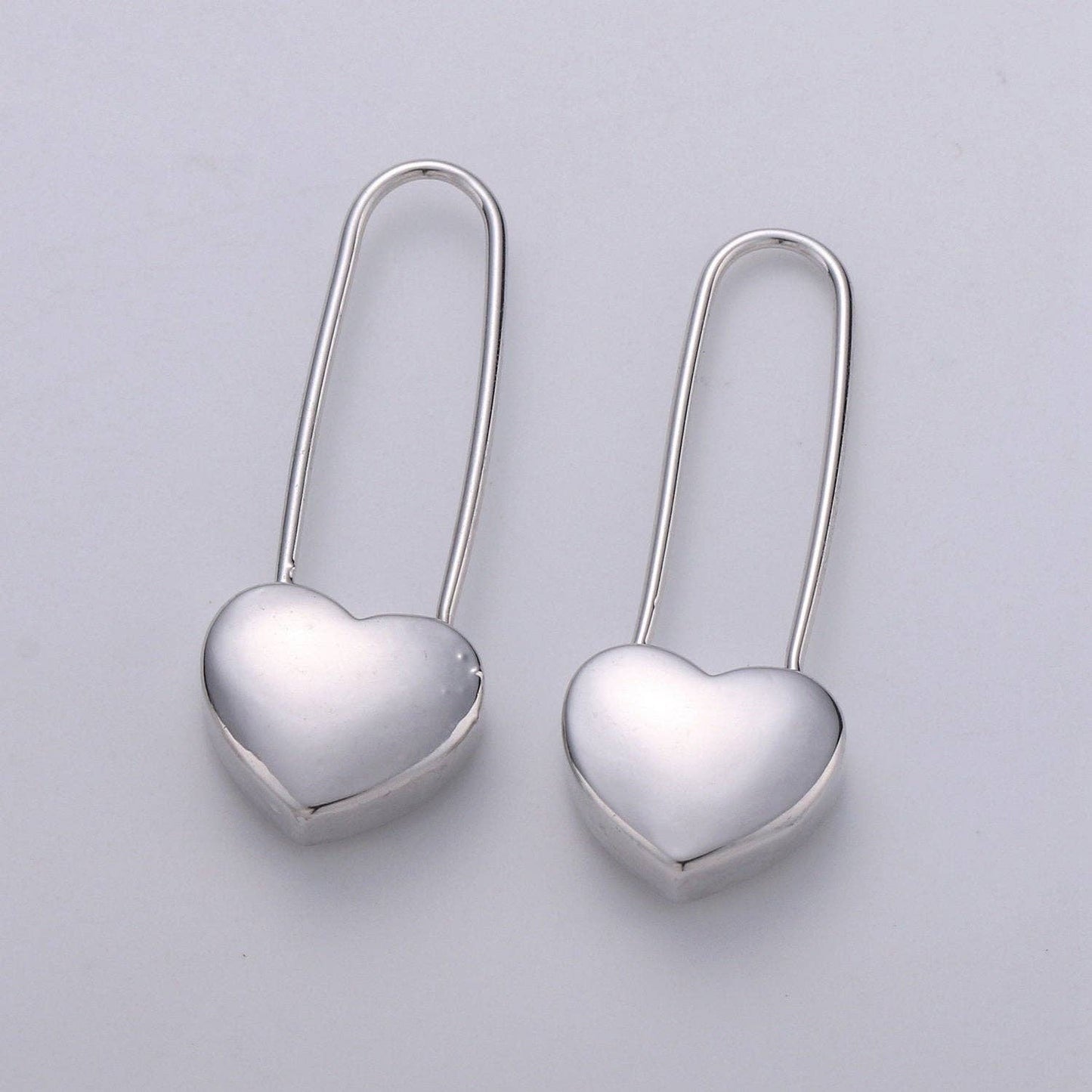 24K Dangle Heart Earrings in Silver