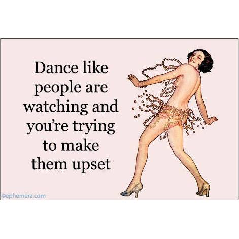 A retro-style graphic magnet with the text 'Dance like people are watching and you're trying to make them upset' on a pale pink background, alongside an illustration of a woman dancing barefoot with dangling beads.
