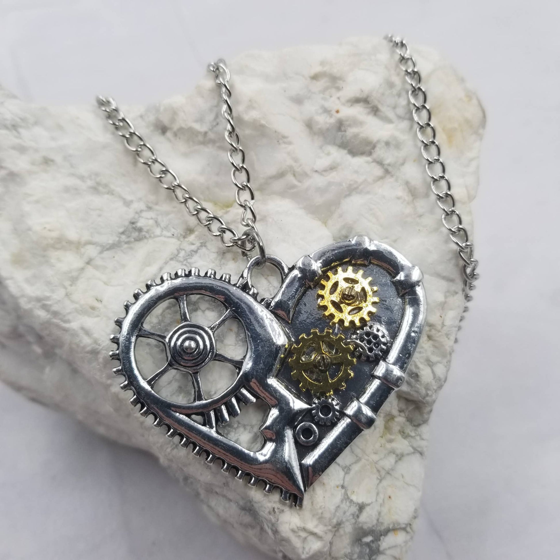 Heart-shaped steampunk necklace with gears 
