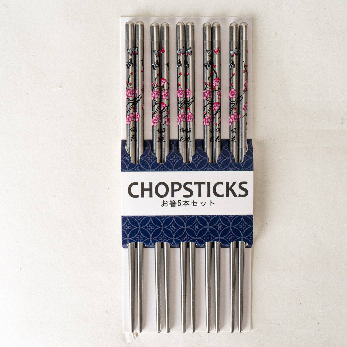 Set of stainless steel chopsticks with floral design packaging