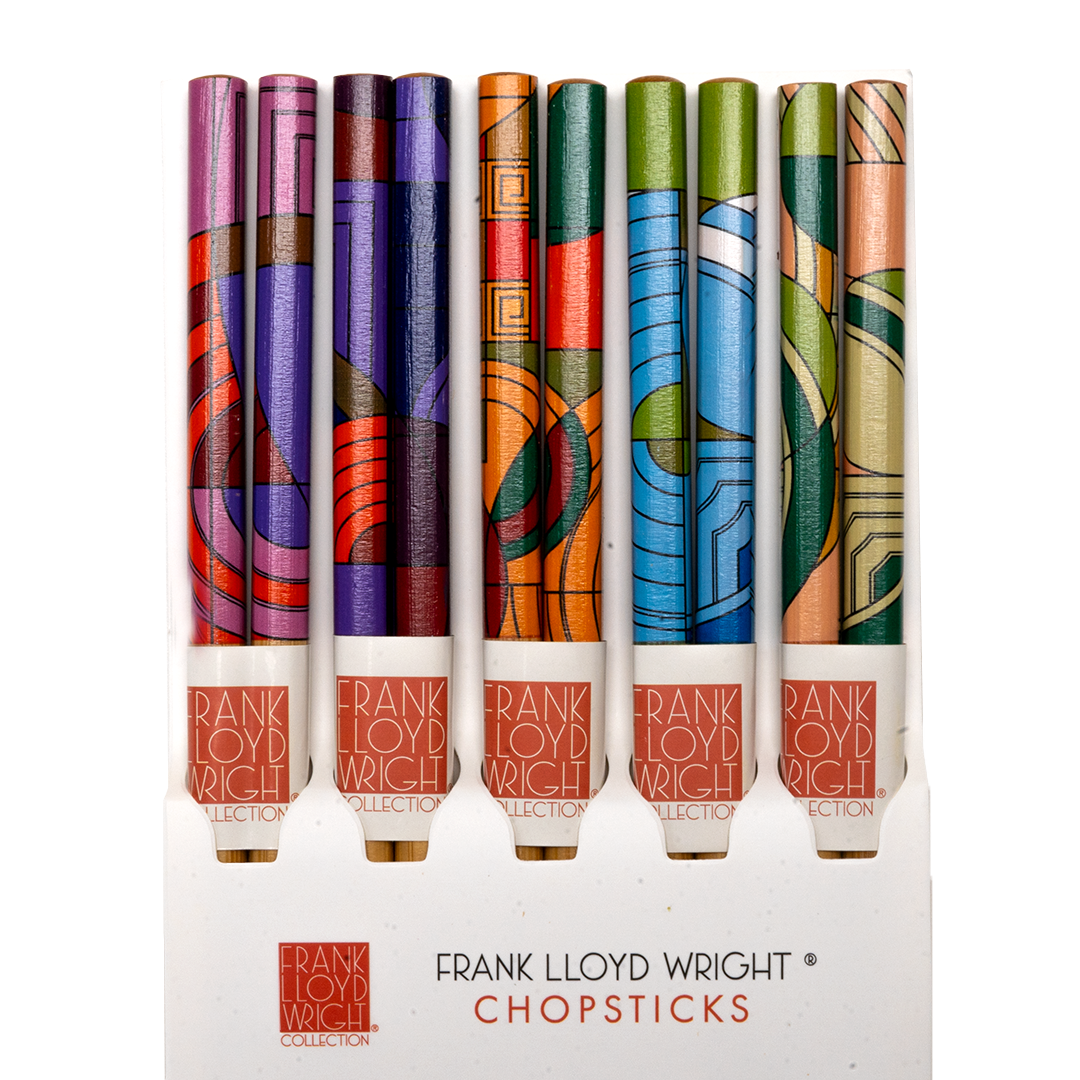A set of 5 Frank Lloyd Wright Chopsticks in a white display box, each featuring a unique colorful Art Deco style pattern on the upper half.