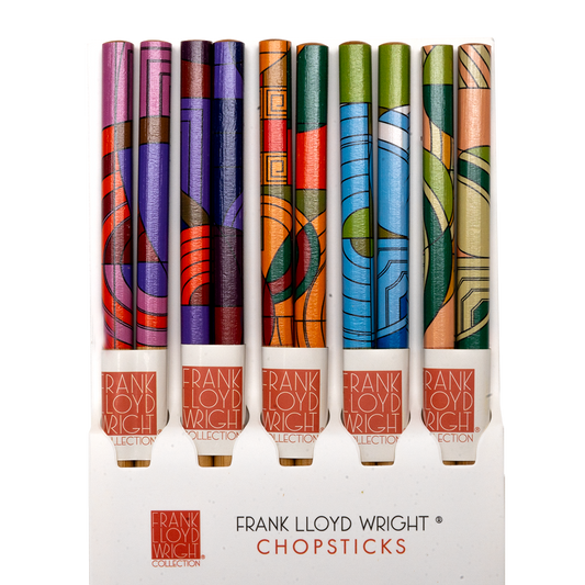 A set of 5 Frank Lloyd Wright Chopsticks in a white display box, each featuring a unique colorful Art Deco style pattern on the upper half.