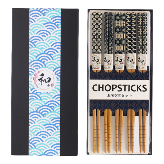 Set of chopsticks with decorative packaging featuring flowers and wave patterns