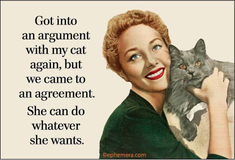 A graphic magnet with a vintage-style illustration of a smiling woman holding a gray cat, next to the text: 'Got into an argument with my cat again, but we came to an agreement. She can do whatever she wants.
