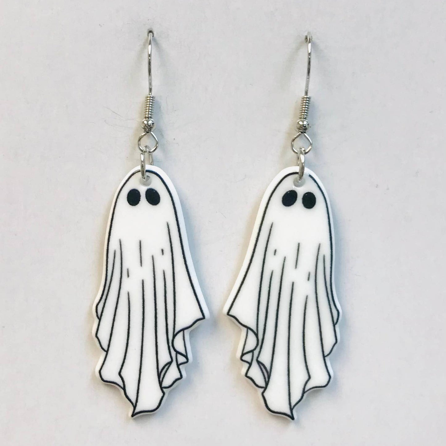 White ghost-shaped earrings 