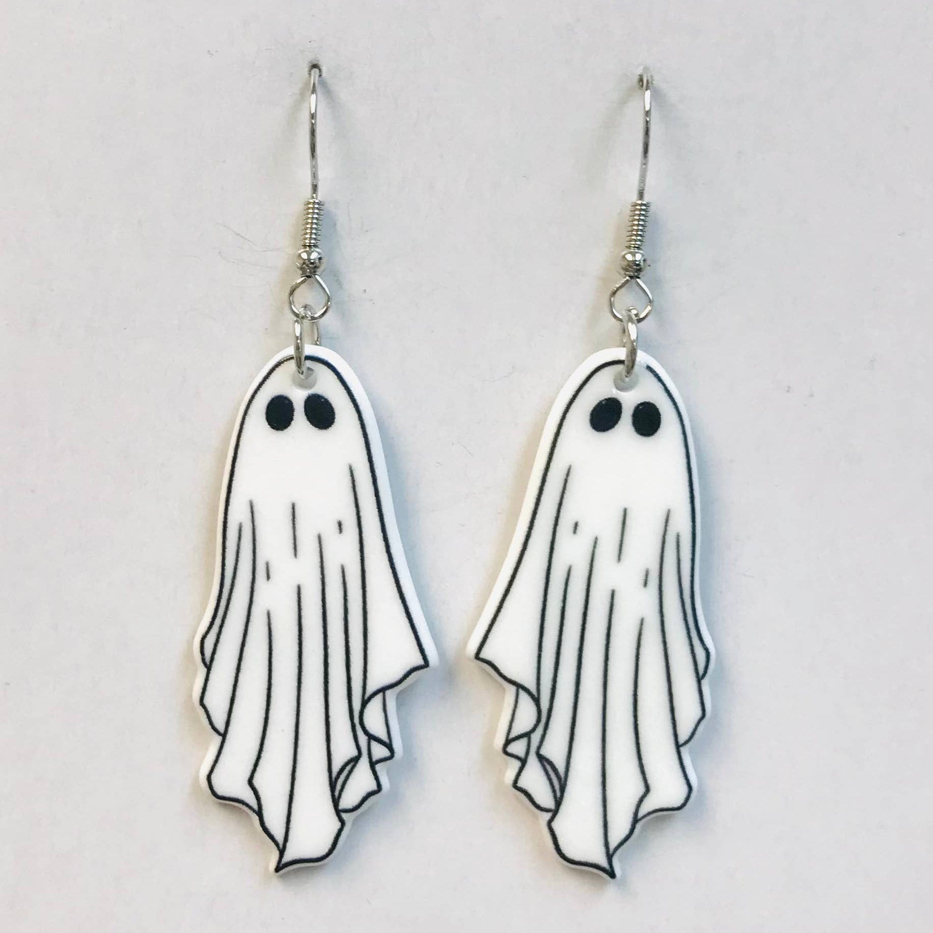 White ghost-shaped earrings 