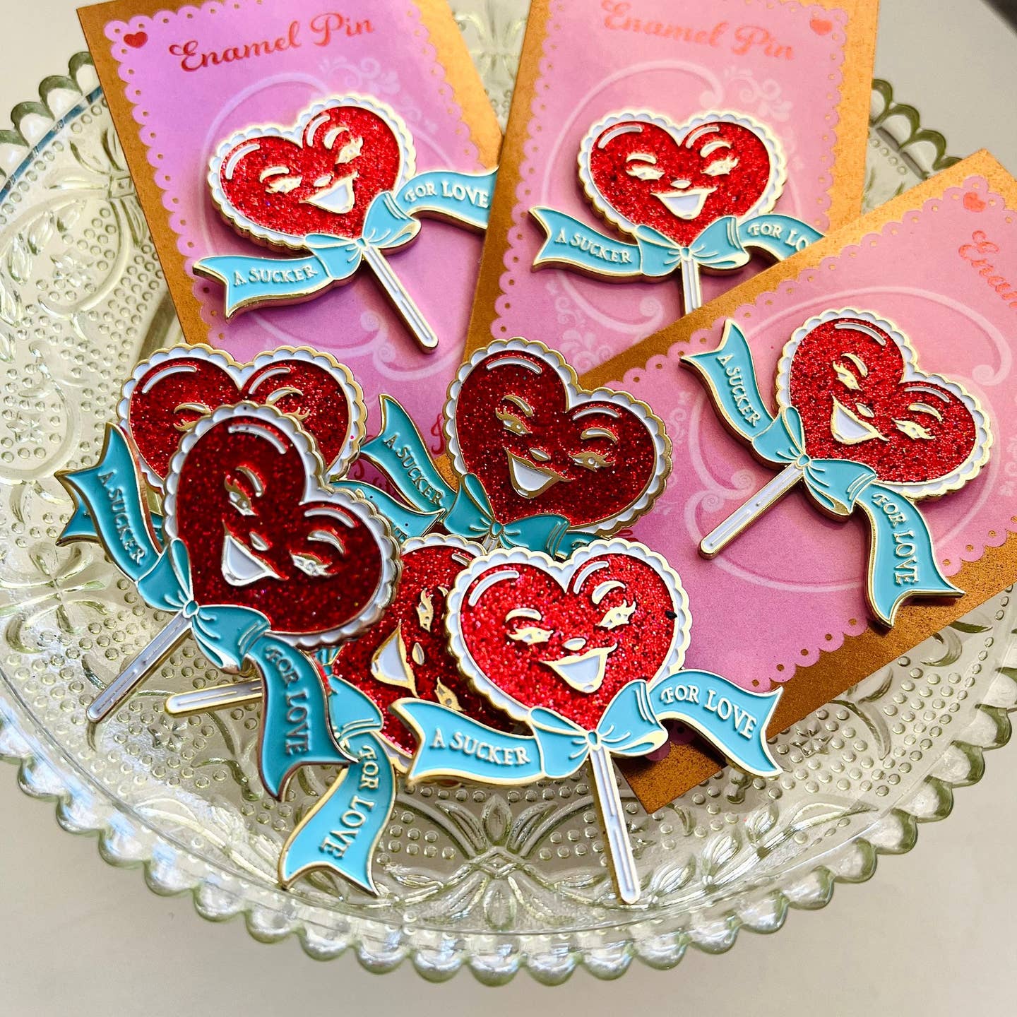 A Sucker For Love Soft Enamel Pin | Heart-Shaped Lollipop with Red Glitter-Kitschy Delish-The Bullish Store