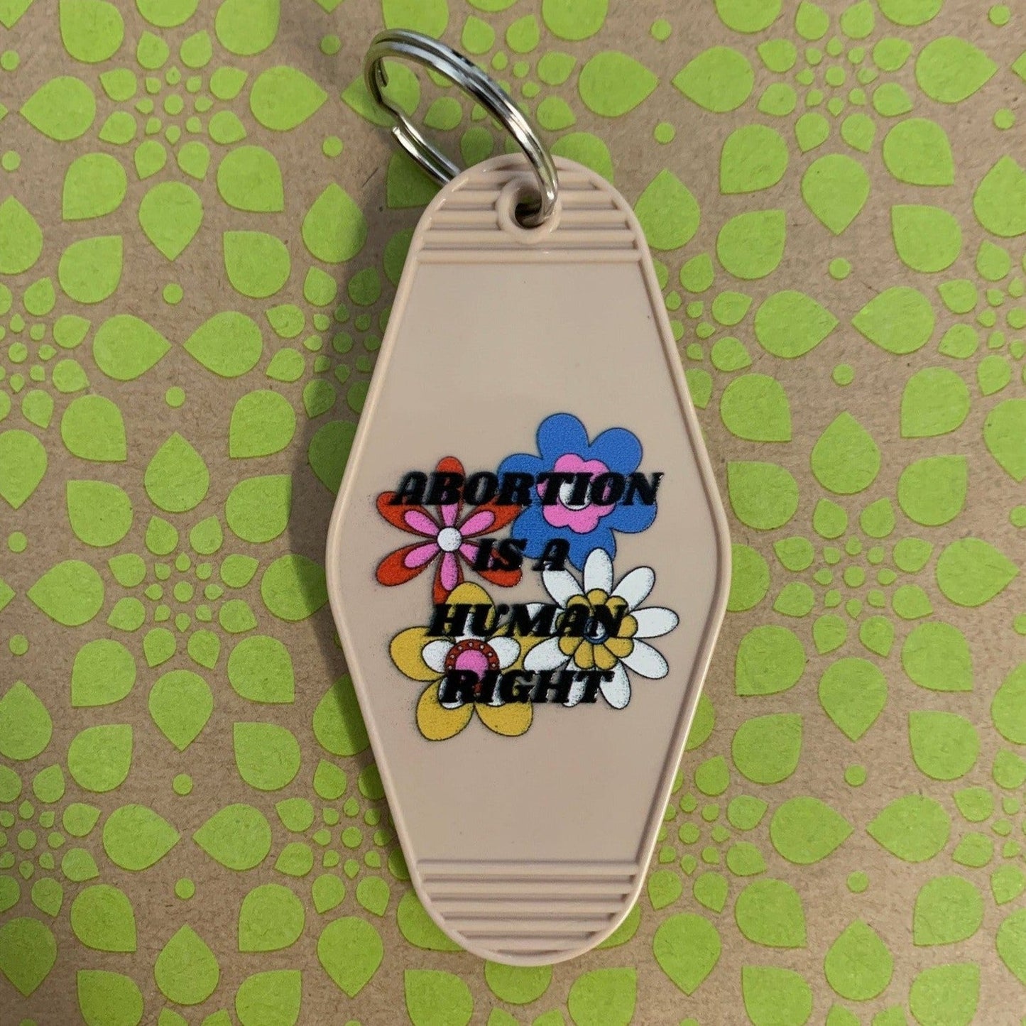 Abortion is a Human Right Keychain in Groovy '70s Flower Print