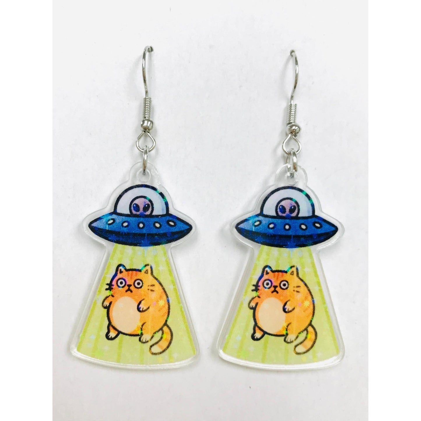 Earrings with alien spaceship and cat design 