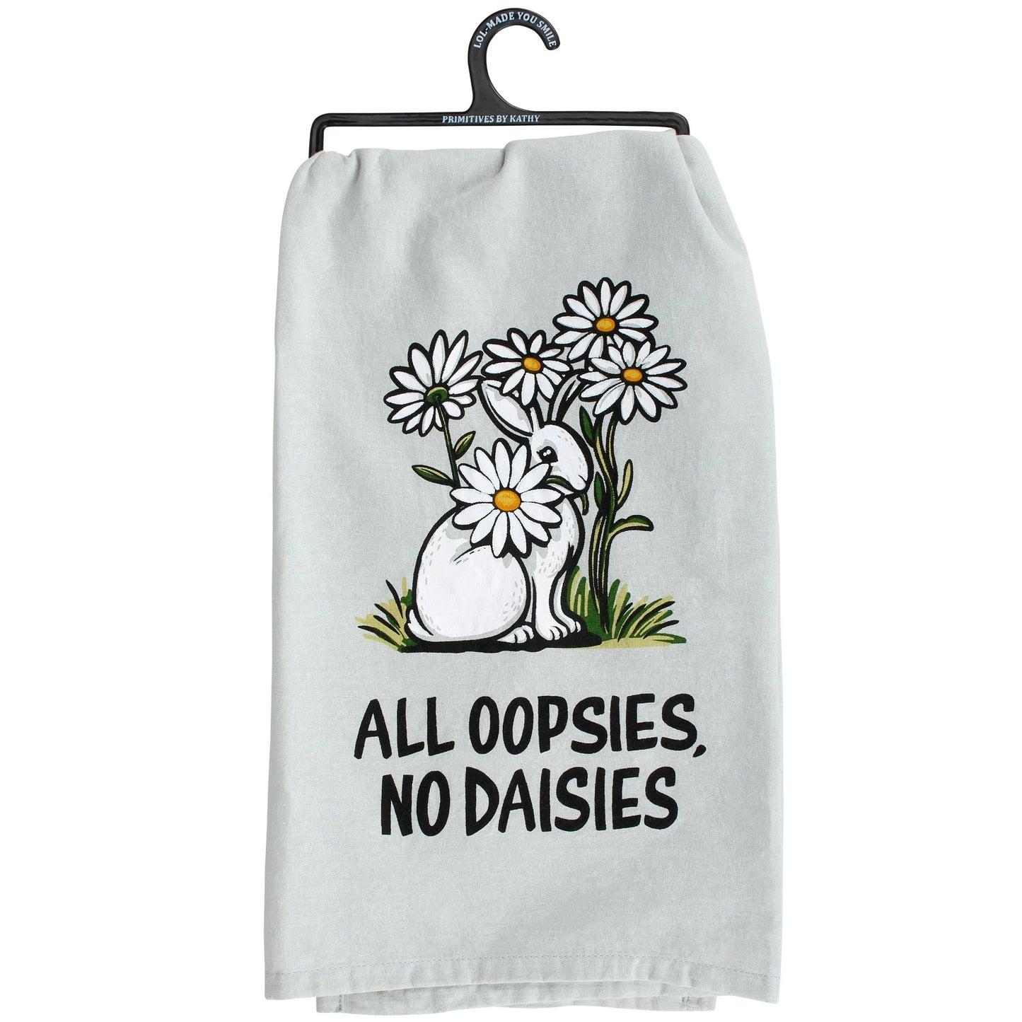 White towel with a bunny and daisies graphic and text 'All oopsies, no daisies' on a white background