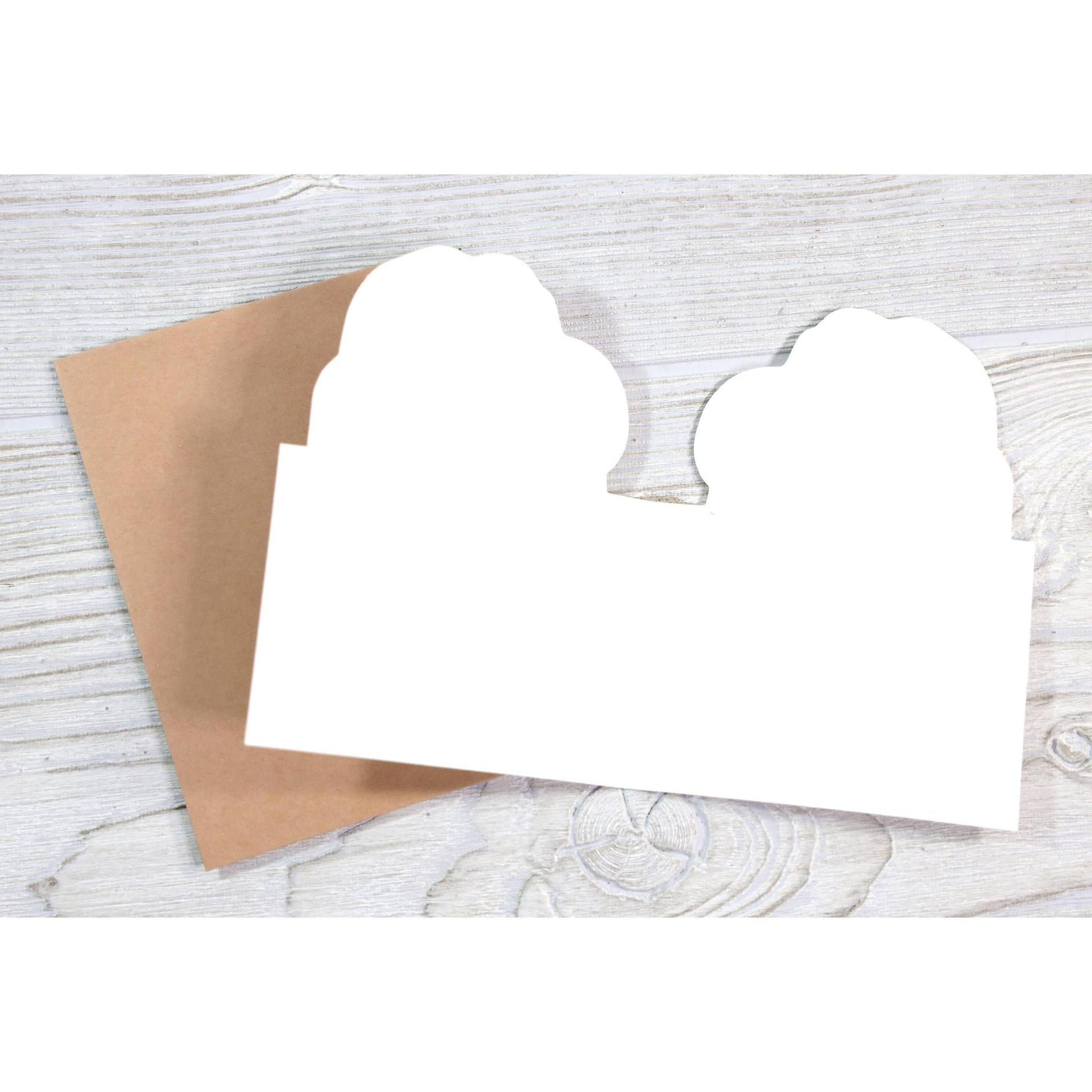 Inside of a blank greeting card with brown envelope