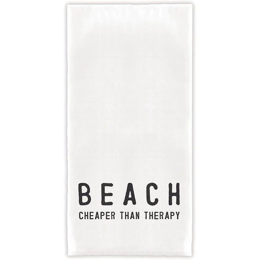 White towel with black text 'BEACH CHEAPER THAN THERAPY' on a white background