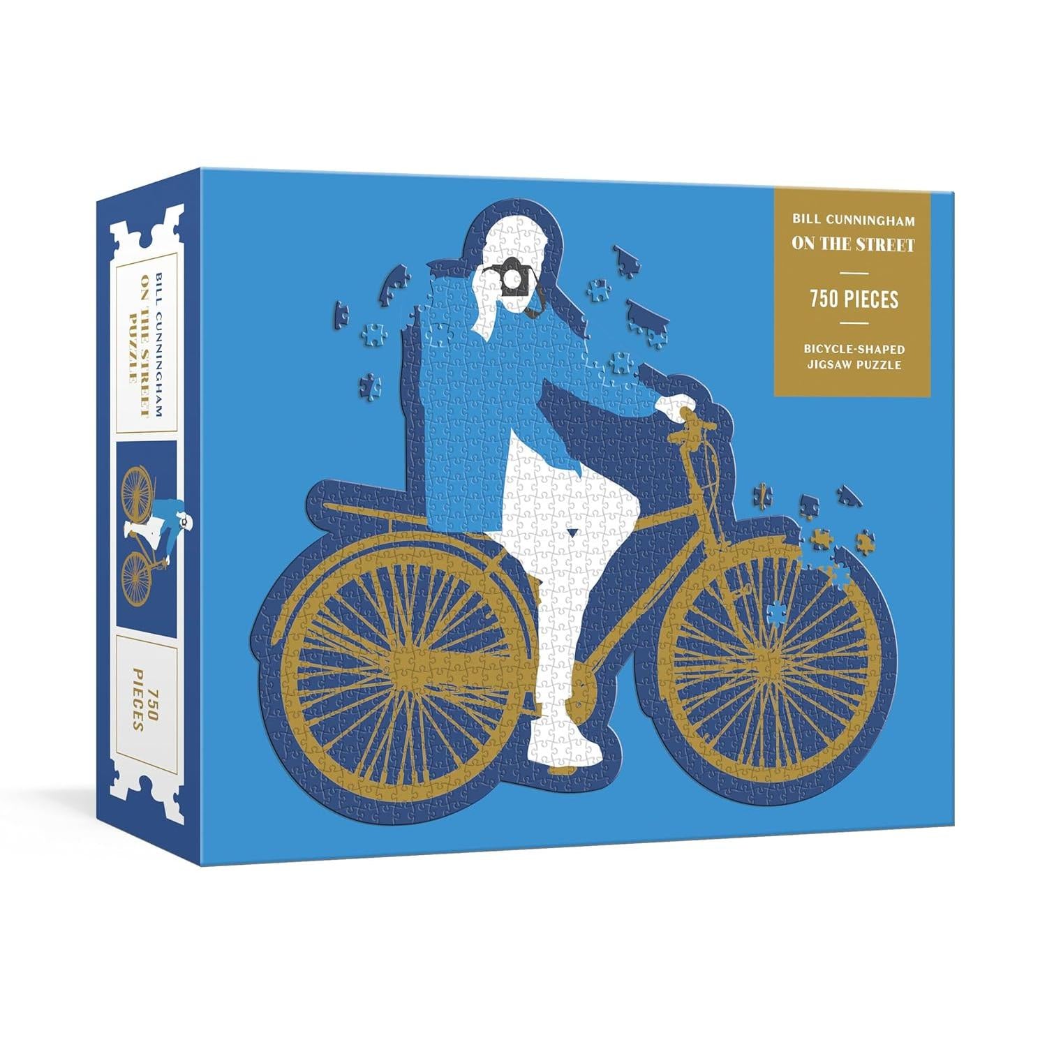 Bicycle-shaped jigsaw puzzle box with a person on a bike illustration on a blue background