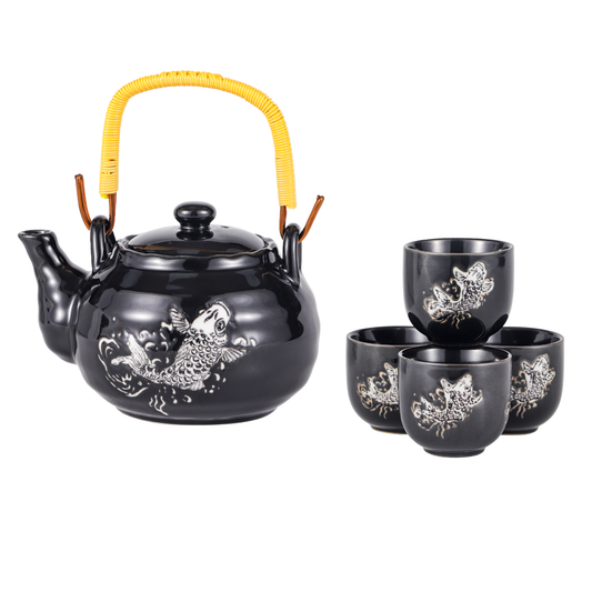 Black ceramic teapot and four cups with fish design