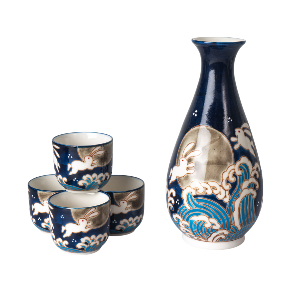 A ceramic sake set featuring a tall blue sake bottle and four matching small cups decorated with white rabbits and blue waves.