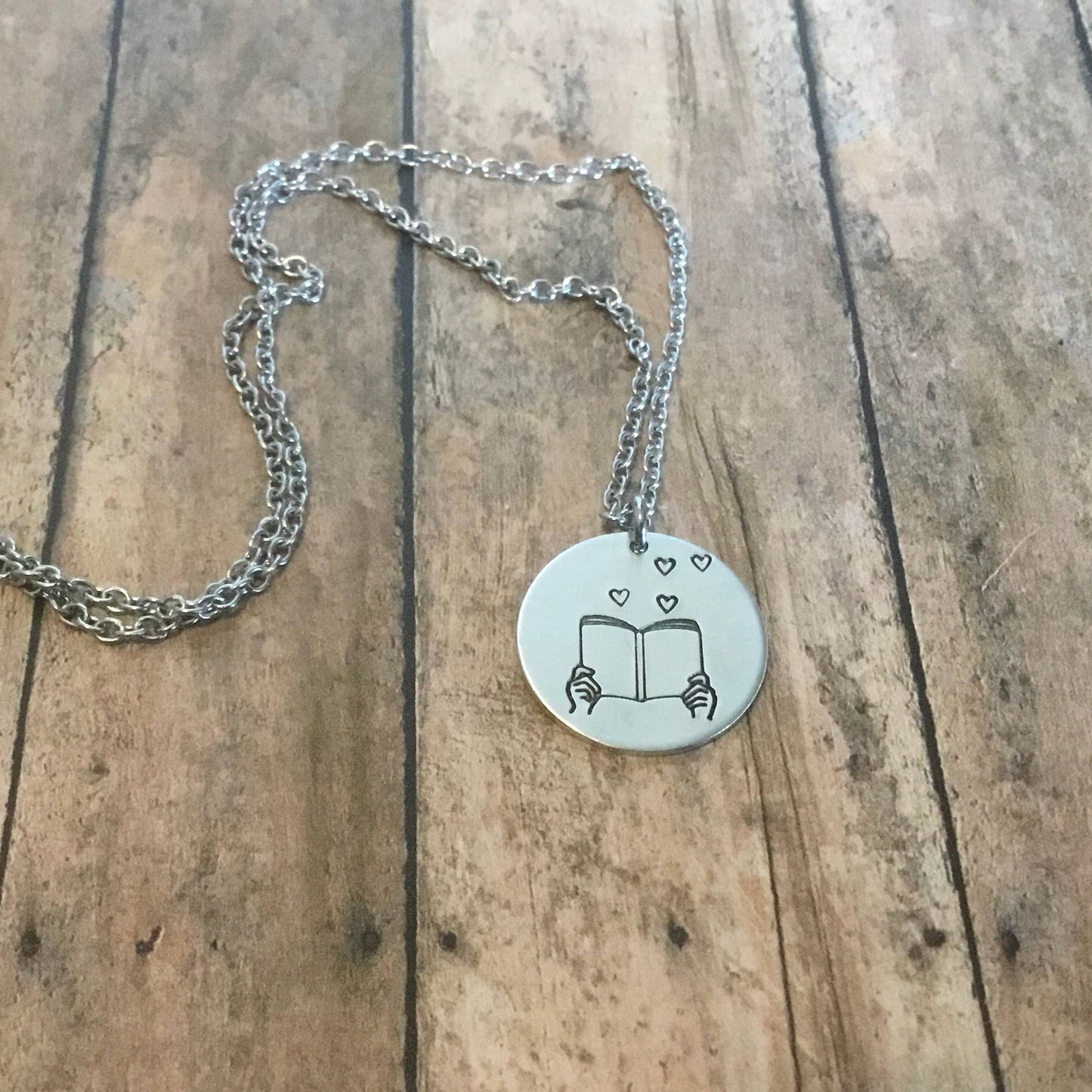 Book With Hearts Handemade Necklace | Circular Stamped Pendant Necklace in Silver