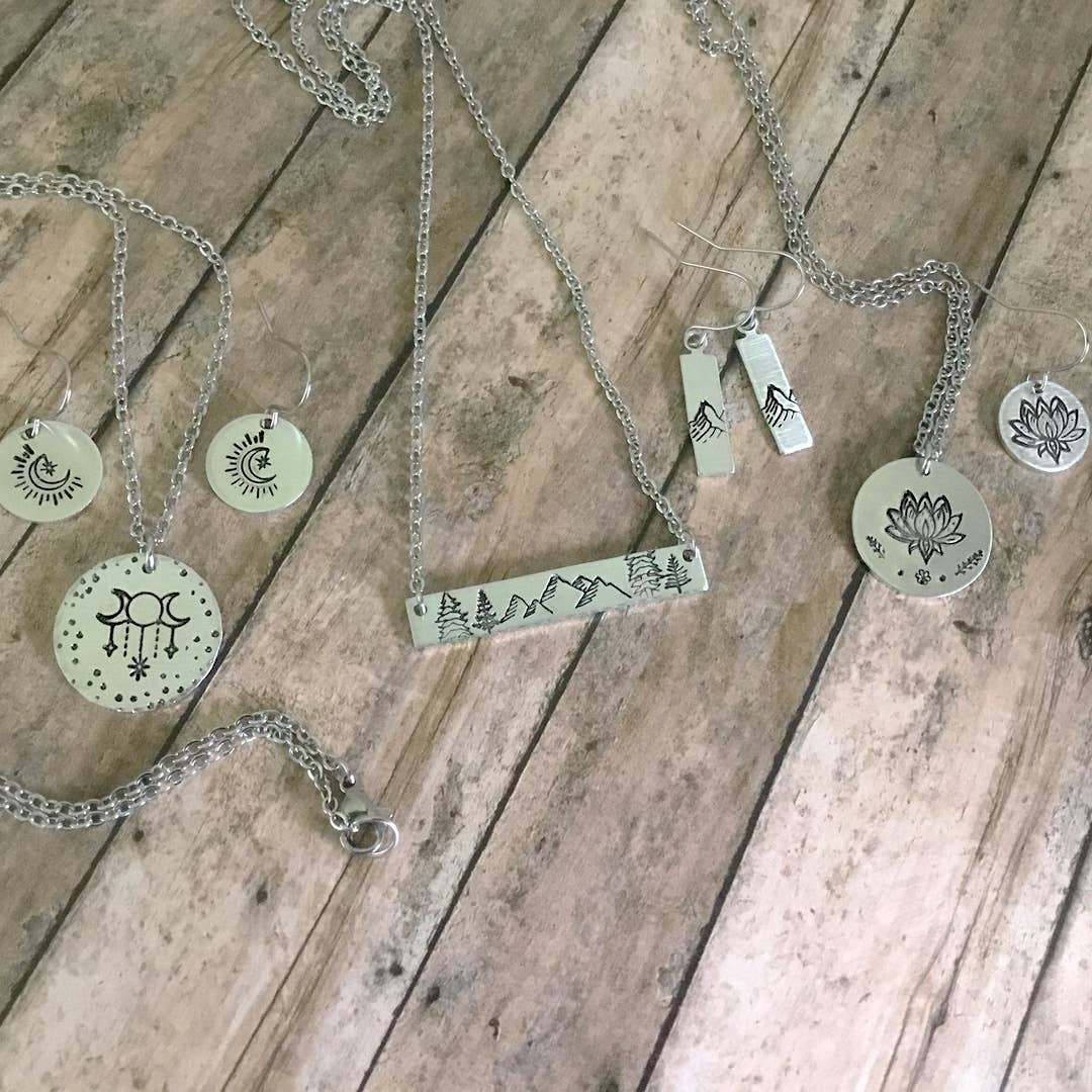 Books & Plants Handmade Necklace | Stack of Books with Plant Circular Stamped Pendant Necklace in Silver