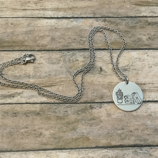Books & Plants Handmade Necklace | Stack of Books with Plant Circular Stamped Pendant Necklace in Silver