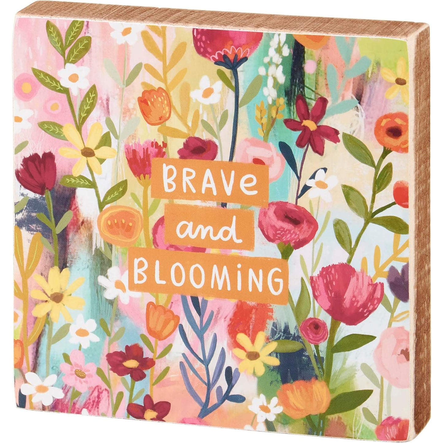Decorative box with floral design and 'Brave and Blooming' text