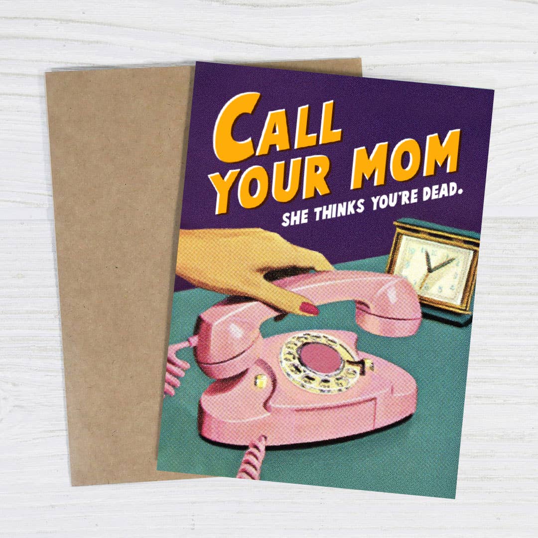 Greeting card with a pink phone and text 'Call Your Mom She Thinks You're Dead' on a purple background.
