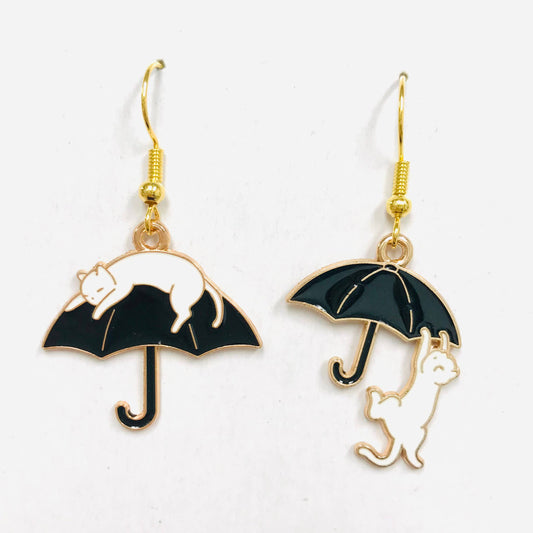 Cat climbing an umbrella earrings 