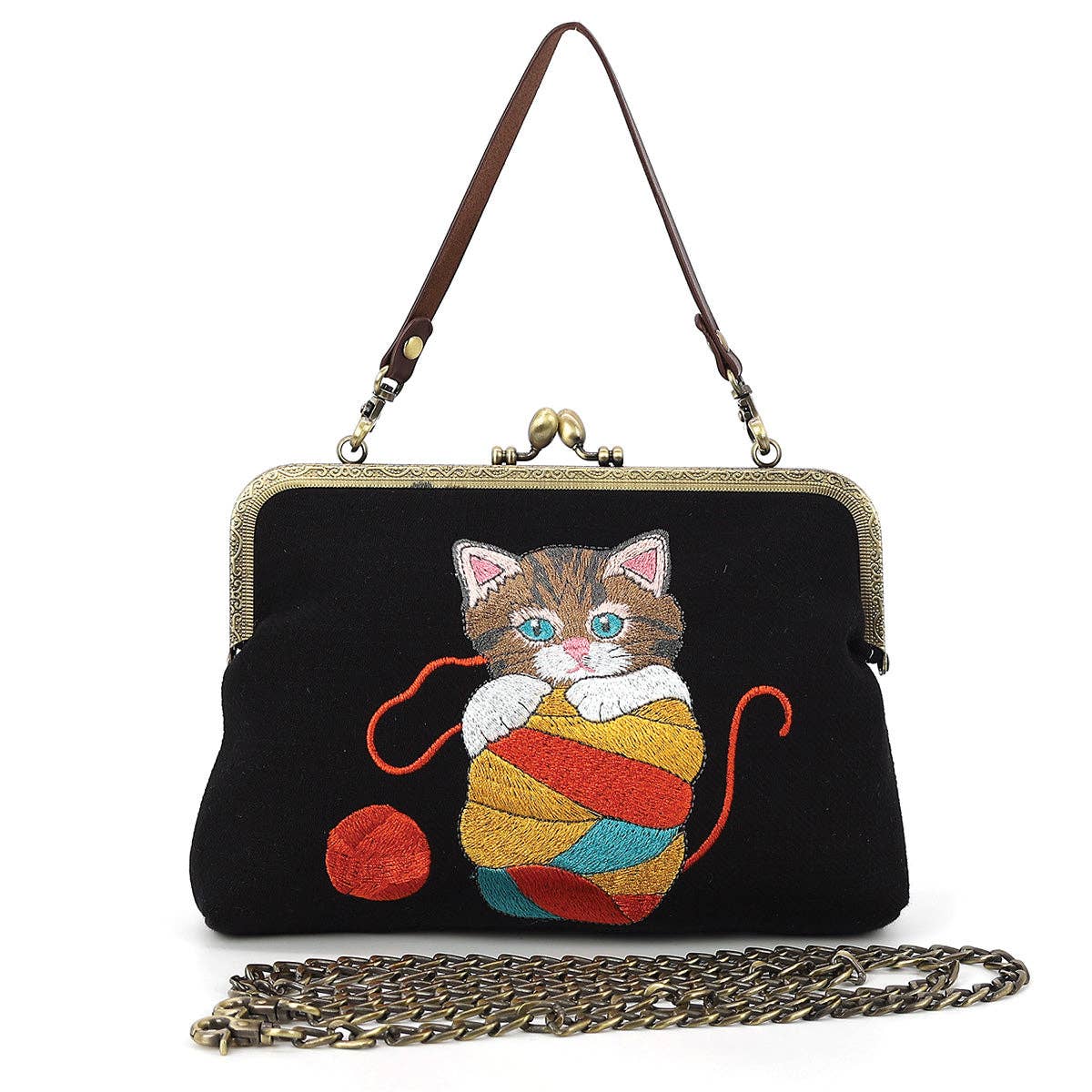 Black kiss-lock clutch handbag with a brown leather shoulder strap and antique bronze chain strap. The front is decorated with an embroidered brown tabby kitten in a colorful ball of red, yellow, and blue yarn.
