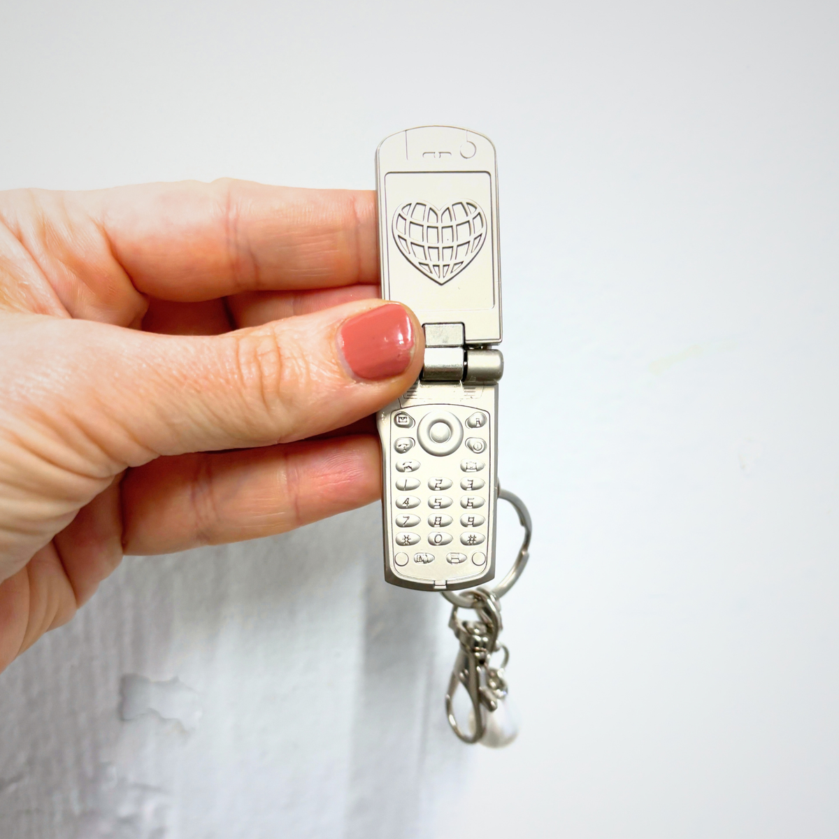 Charmed Pearl Y2K Flip Phone Fidget Keychain | Spinning Silver Flip Phone Charm-GetBullish-The Bullish Store