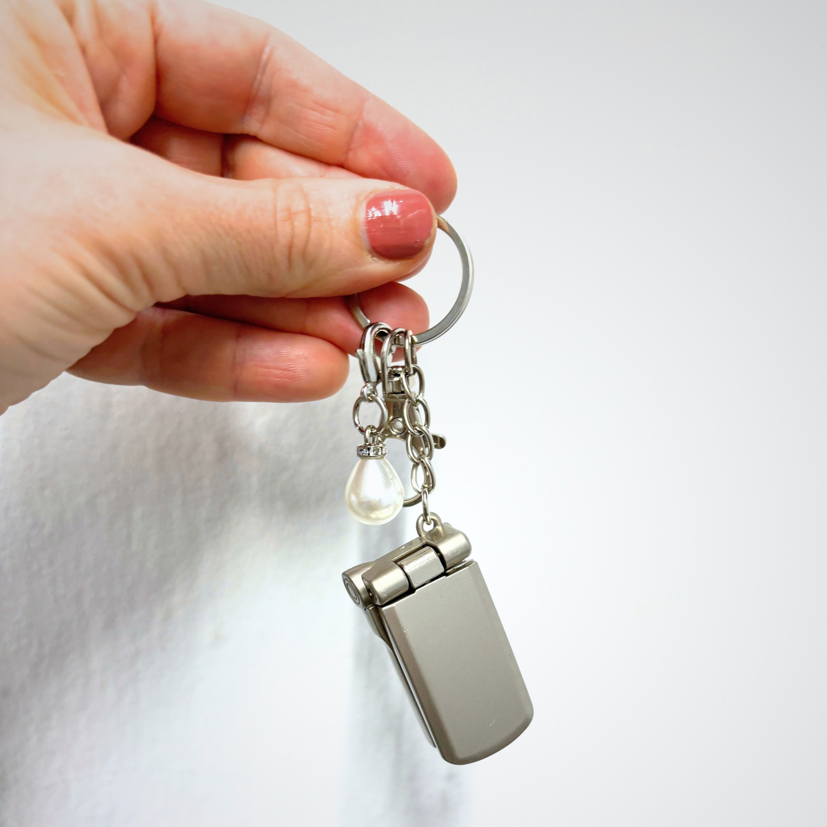 Charmed Pearl Y2K Flip Phone Fidget Keychain | Spinning Silver Flip Phone Charm-GetBullish-The Bullish Store