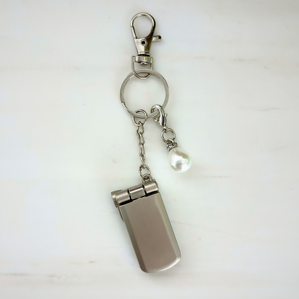 Charmed Pearl Y2K Flip Phone Fidget Keychain | Spinning Silver Flip Phone Charm-GetBullish-The Bullish Store