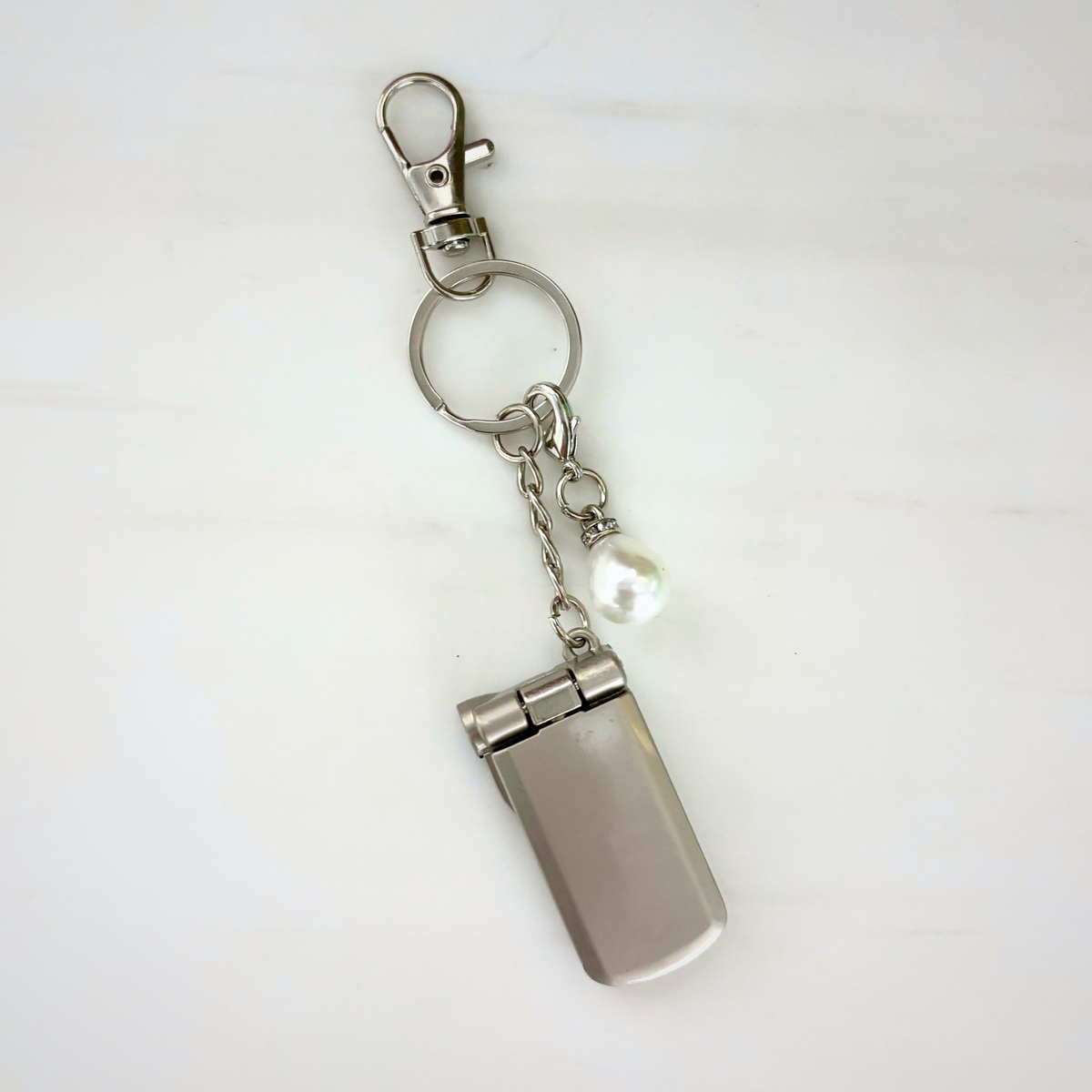 Charmed Pearl Y2K Flip Phone Fidget Keychain | Spinning Silver Flip Phone Charm-GetBullish-The Bullish Store