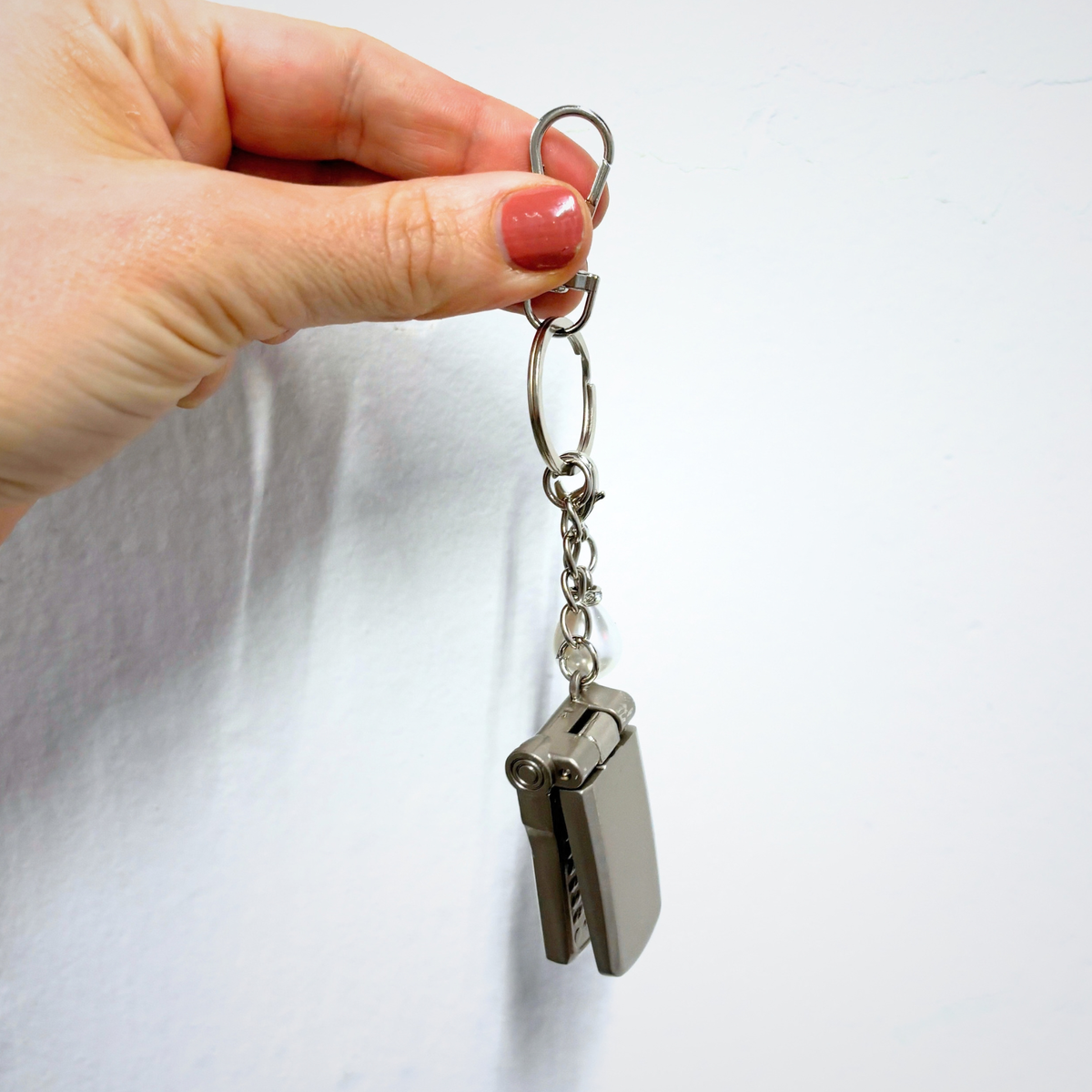 Charmed Pearl Y2K Flip Phone Fidget Keychain | Spinning Silver Flip Phone Charm-GetBullish-The Bullish Store