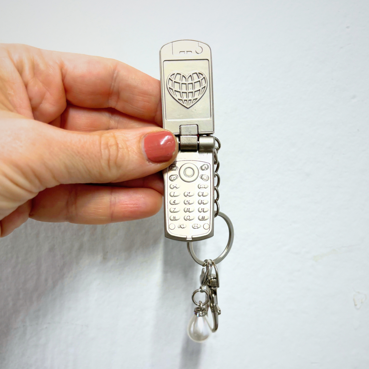 Charmed Pearl Y2K Flip Phone Fidget Keychain | Spinning Silver Flip Phone Charm-GetBullish-The Bullish Store