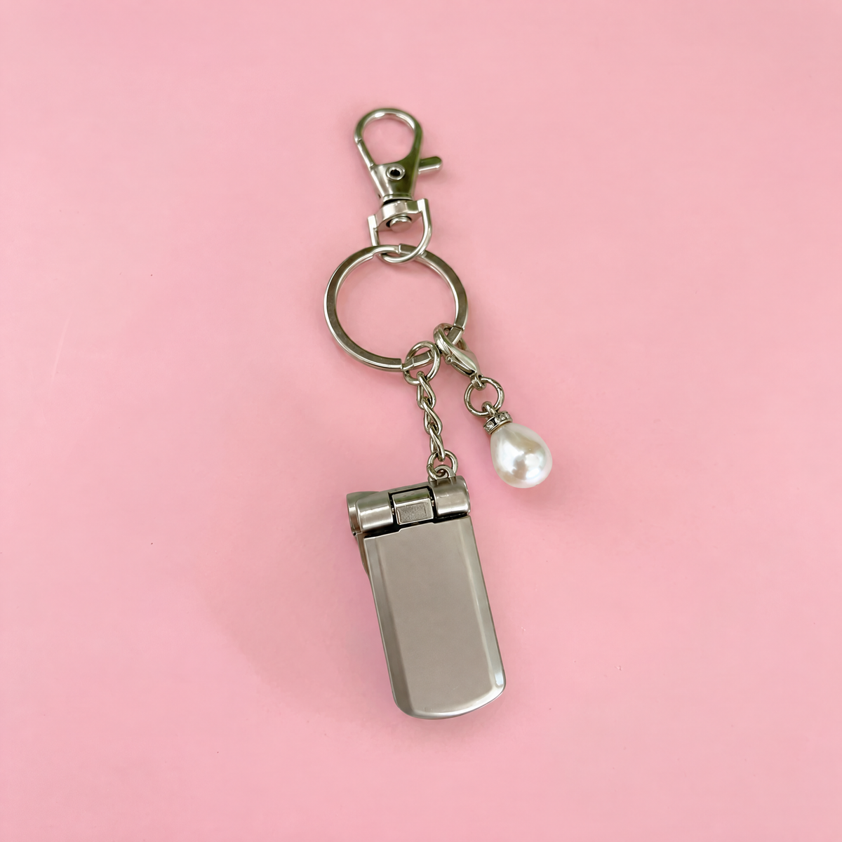 Charmed Pearl Y2K Flip Phone Fidget Keychain | Spinning Silver Flip Phone Charm-GetBullish-The Bullish Store