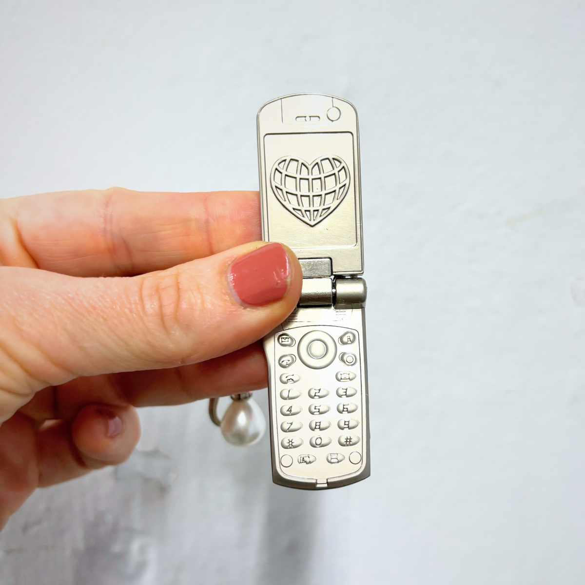 Charmed Pearl Y2K Flip Phone Fidget Keychain | Spinning Silver Flip Phone Charm-GetBullish-The Bullish Store