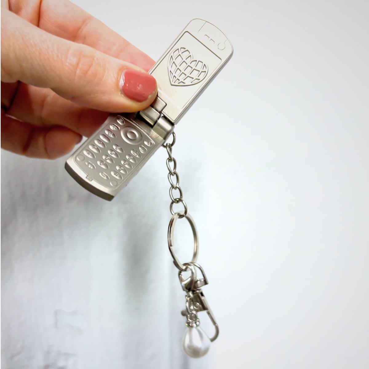 Charmed Pearl Y2K Flip Phone Fidget Keychain | Spinning Silver Flip Phone Charm-GetBullish-The Bullish Store