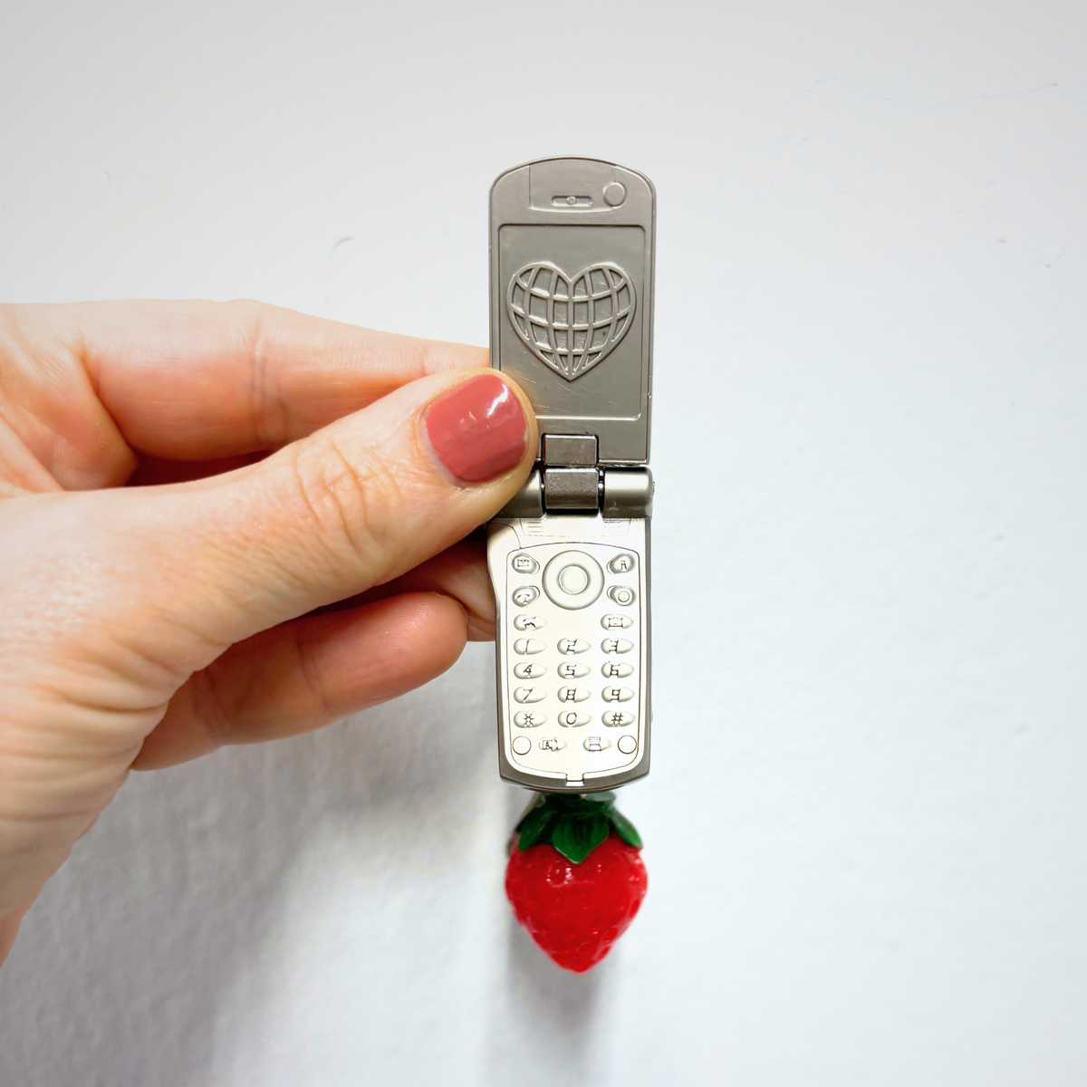 Charmed Strawberry Y2K Flip Phone Fidget Keychain | Spinning Silver Flip Phone Charm-GetBullish-The Bullish Store