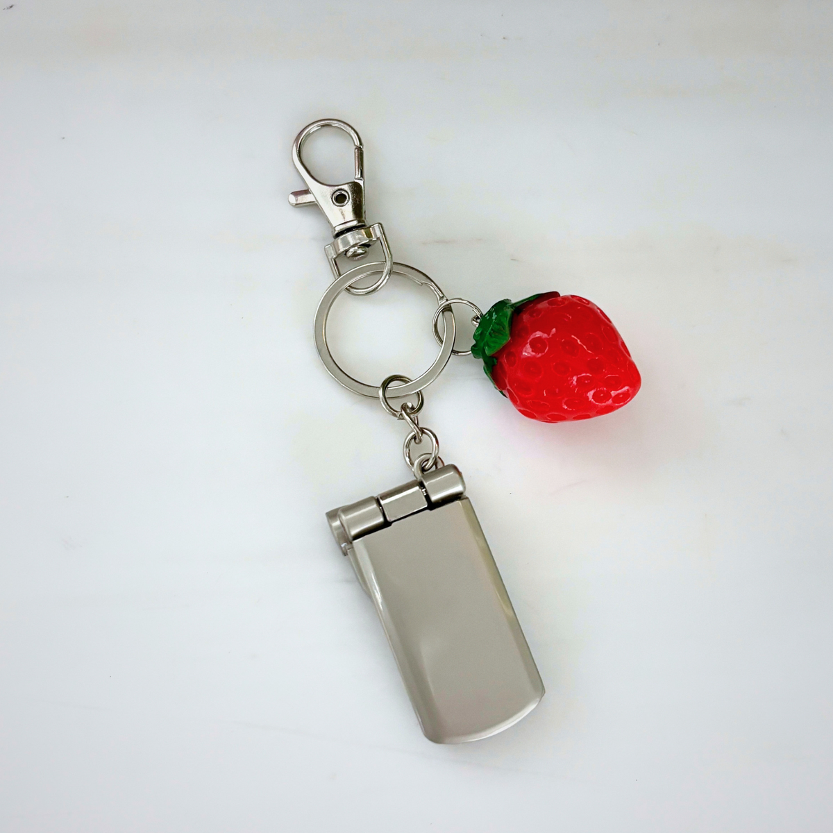 Charmed Strawberry Y2K Flip Phone Fidget Keychain | Spinning Silver Flip Phone Charm-GetBullish-The Bullish Store