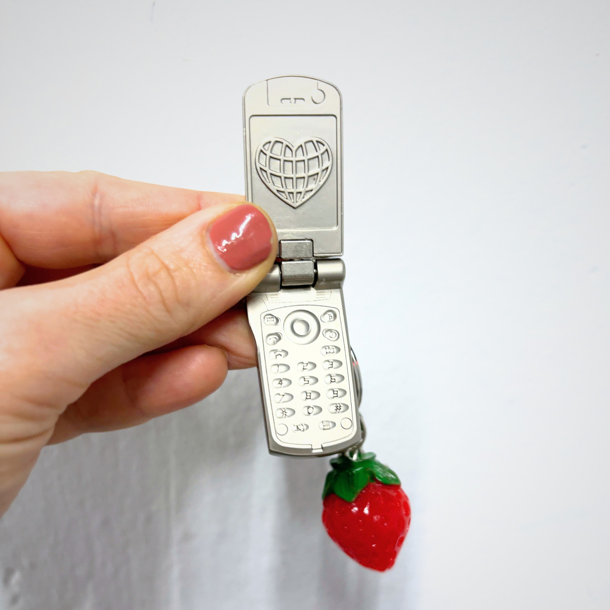 Charmed Strawberry Y2K Flip Phone Fidget Keychain | Spinning Silver Flip Phone Charm-GetBullish-The Bullish Store