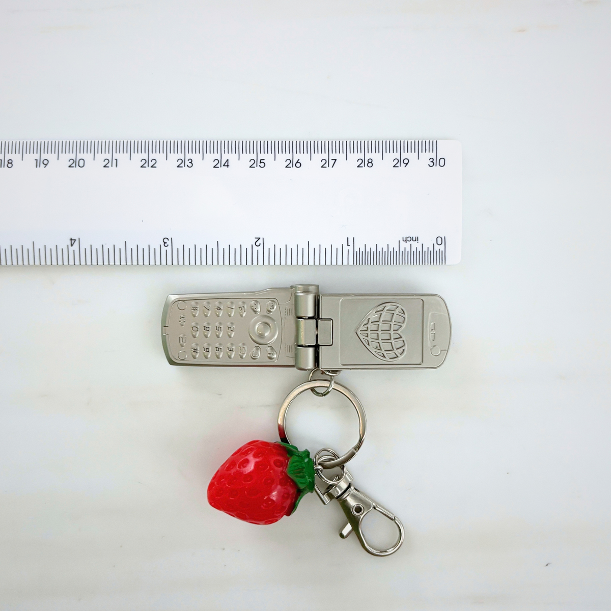 Charmed Strawberry Y2K Flip Phone Fidget Keychain | Spinning Silver Flip Phone Charm-GetBullish-The Bullish Store