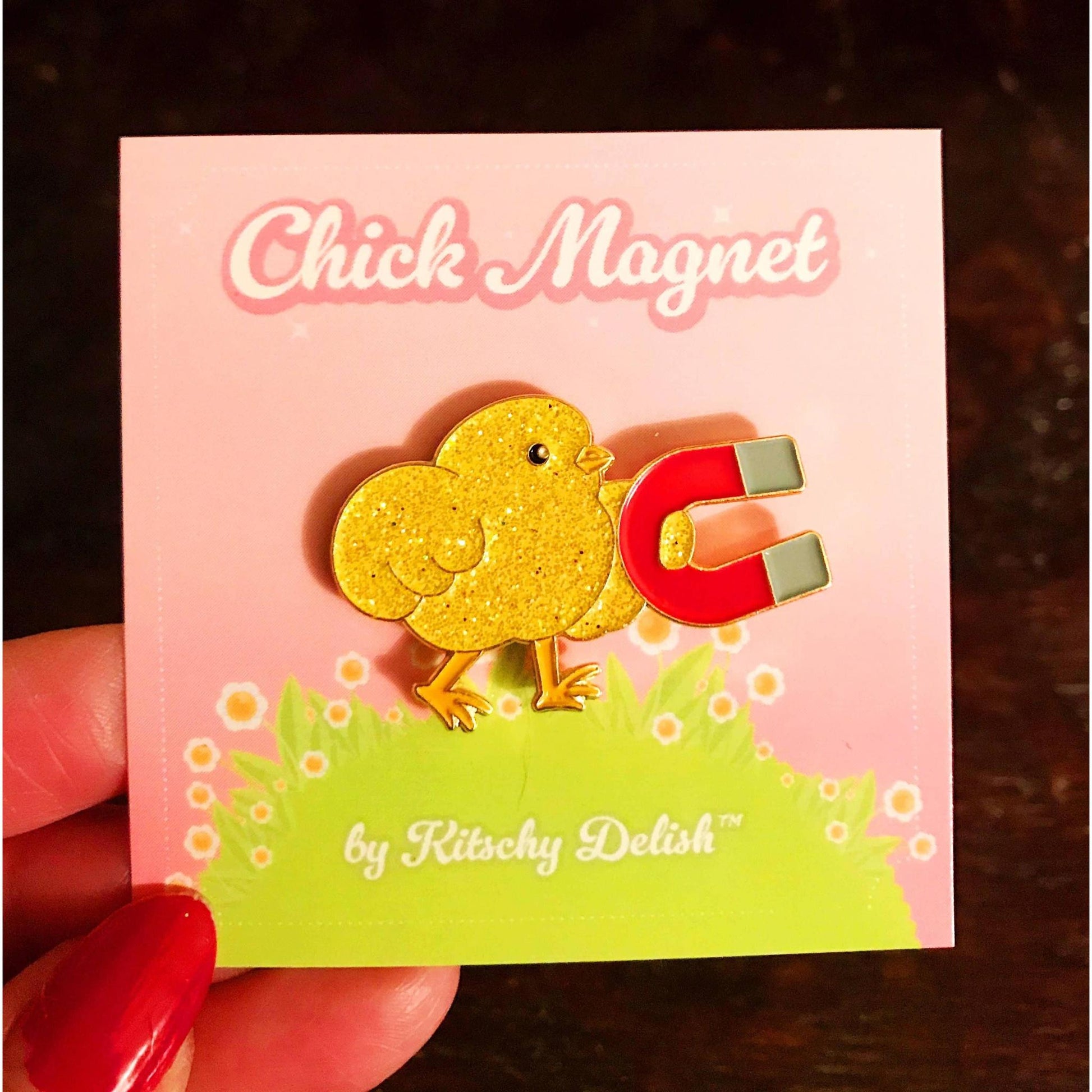 Pin with a chick and magnet design on a 'Chick Magnet' card by Kitschy Delish