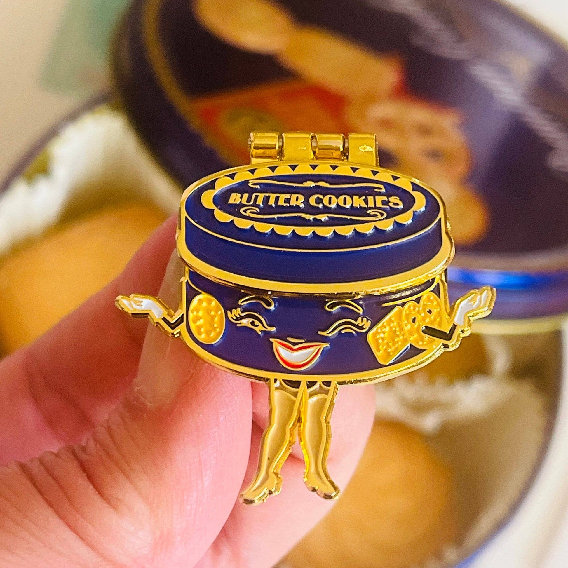Butter cookies container with a decorative lid held pin